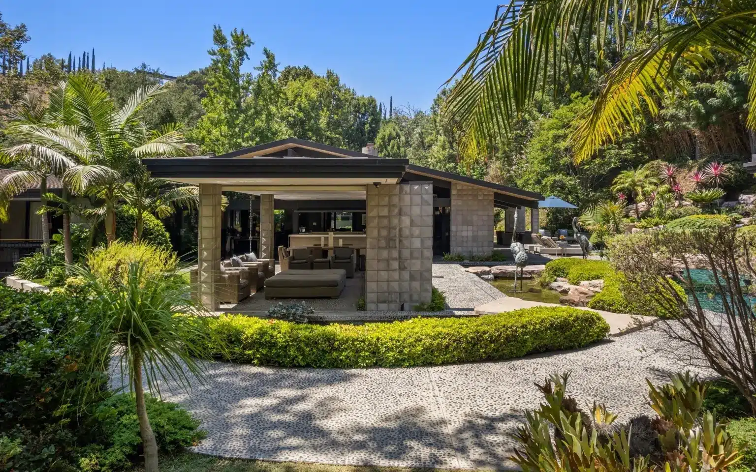 Lizzo Buys Jeremy Renner’s Hollywood Hills Mansion For $12.4 Million