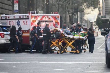 Four including NYPD officer, killed in Midtown Manhattan shooting ...