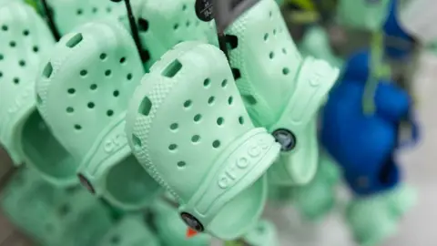Crocs US sales tumble as shoppers choose trainers Crocs US sales tumble as shoppers choose trainers