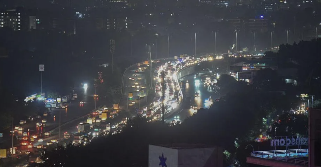 Eight-hour traffic jams in Delhi suburb as rains wreak havoc