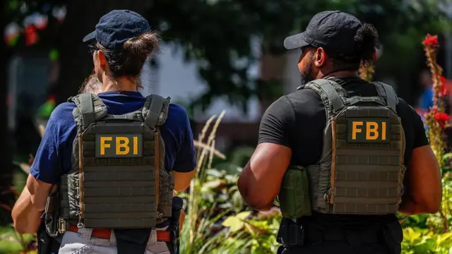 Sacked agents sue FBI, saying they were punished for taking the knee FBI fires agents pictured kneeling at George Floyd protest, US media reports