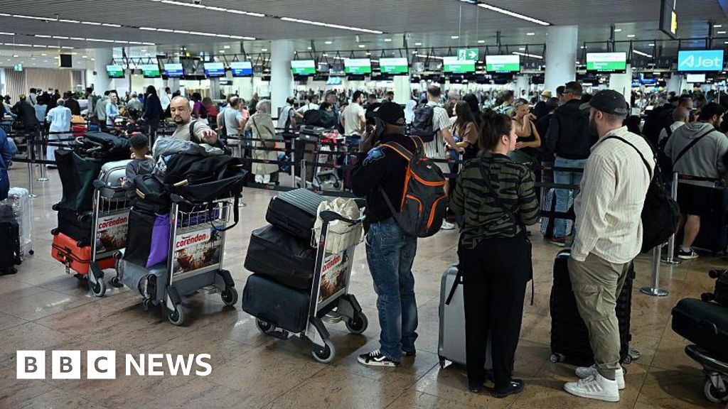 Man arrested in connection with cyber-attack on airports Man arrested in connection with cyber-attack on airports