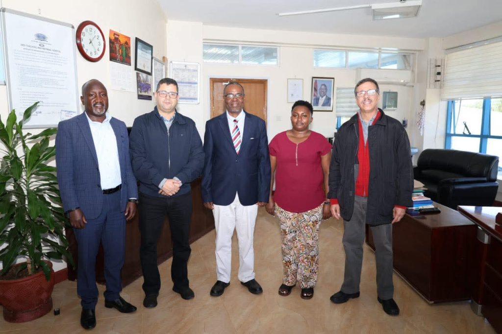 MTRH CEO Dr. Philip K. Kirwa, Dr. Owen Menach (Director of Surgical Services, MTRH), Angella Kiragu (Senior Audiologist, MTRH), and Moroccan ENT specialists Prof. Raji and Prof. Benhoumad at the cochlear implant programme at Moi Teaching and Referral Hospital