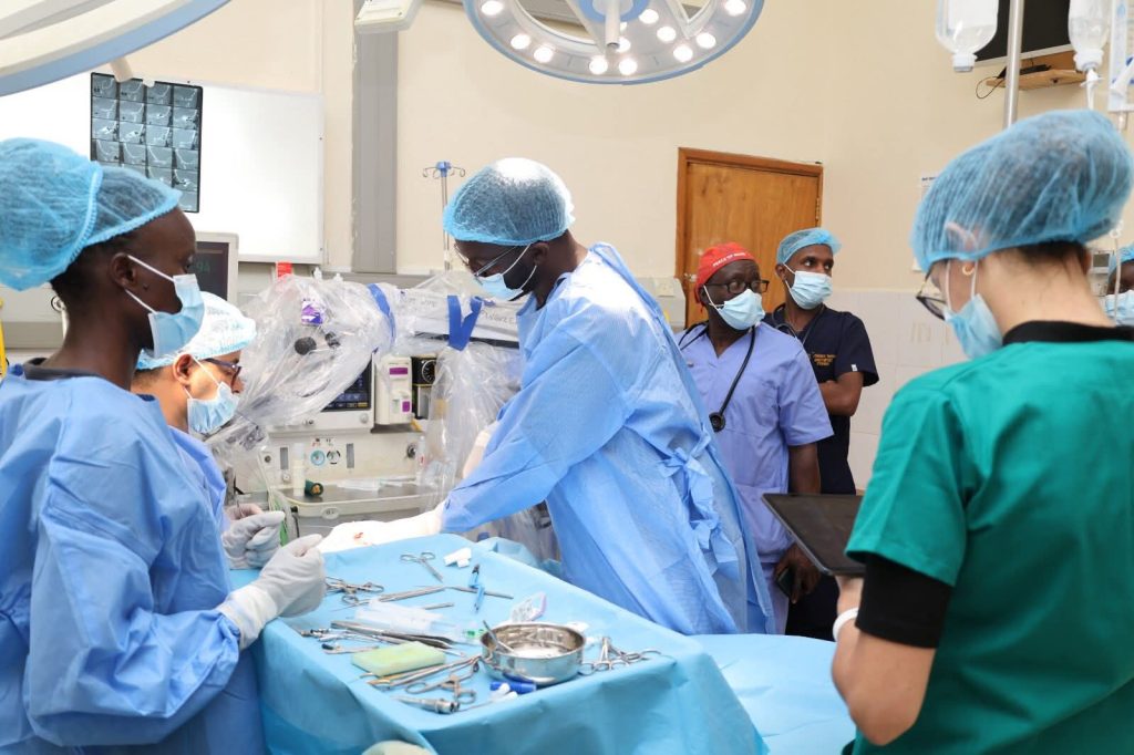 Surgeons from MTRH and Morocco performing a cochlear implant surgery in the operating theatre, assisted by the multidisciplinary medical team, as part of the ‘United, We Hear Better’ programme
