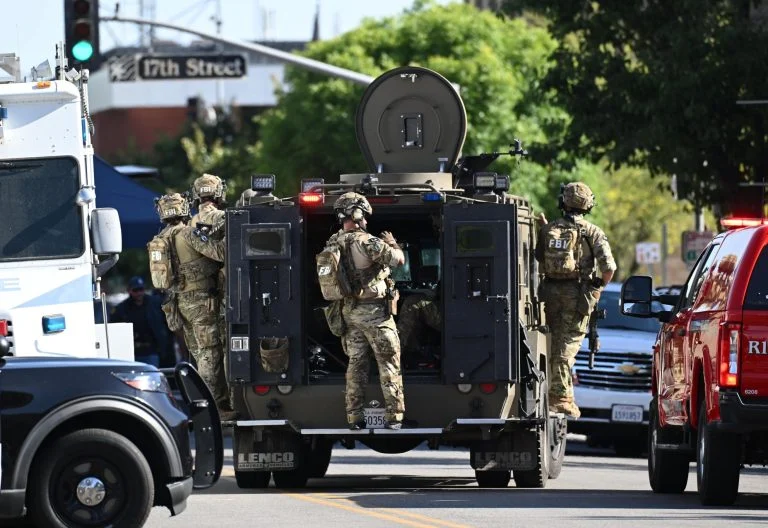 Man shot dead by FBI after taking hostages at California bank Man shot dead by FBI after taking hostages at California bank