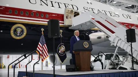 Trump unveils Qatari luxury jet for Air Force One fleet
