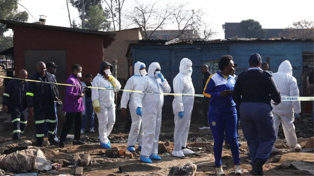 Manhunt under way in South Africa after 12 killed 