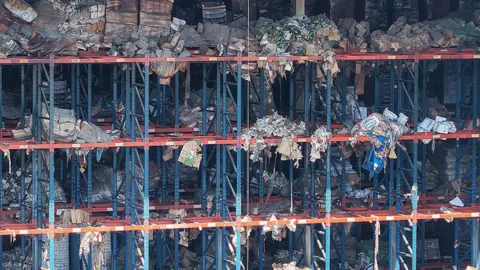 Tonnes of rotting food from vast LA warehouse fire creates unbearable stench