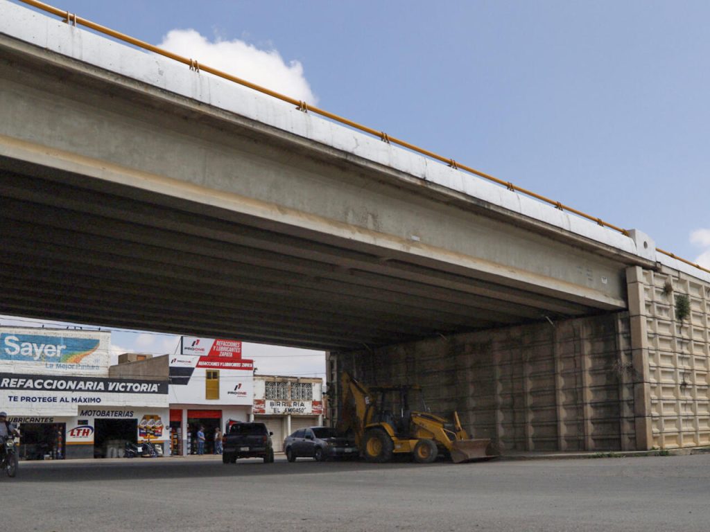 Bodies hanging from bridge revive violence in once-calm town in Mexico