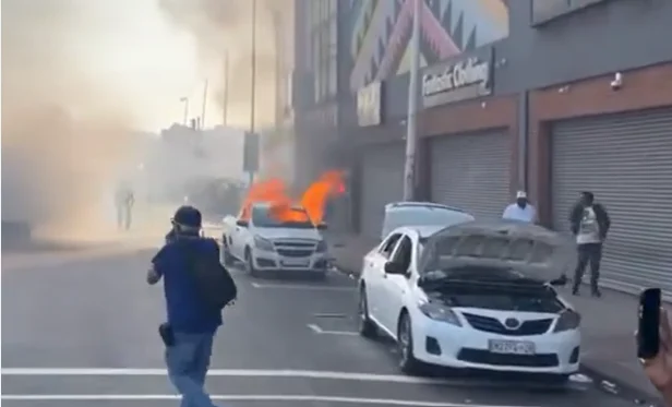 Cars torched and shops looted as anti-migrant violence erupts in South Africa